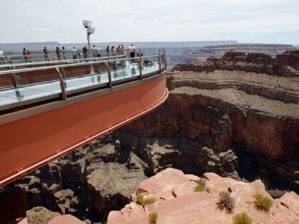 GRAND CANYON WEST, AZ - JUNE 12: Visitors are seen at the Grand Canyon Skywalk June 12, 20