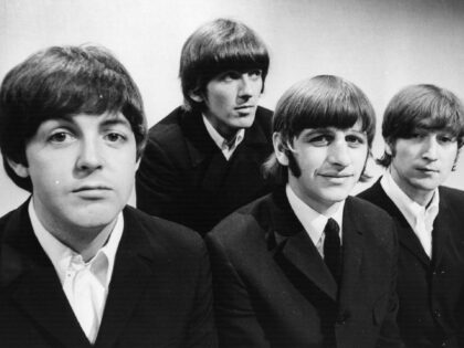 Portrait of British pop group The Beatles (L-R) Paul McCartney, George Harrison (1943 - 20