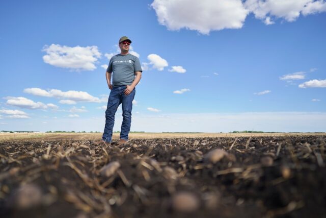 Canadian farmers like Ian Chitwood -- on his canola farm in Alberta, Canada -- are having