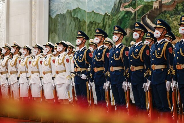Chinese honor guards take formation at the Great Hall of the People in Beijing on June 28,