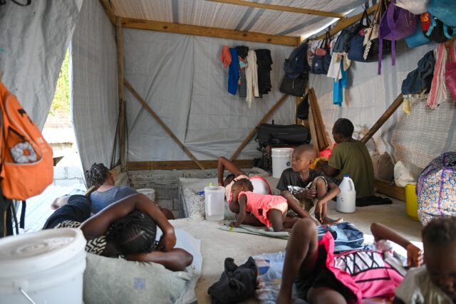 Families fleeing Haiti's swirling gang violence gather in a part of the capital Port-au-Pr