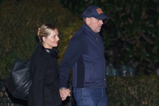 Hunter Biden, son of US President Joe Biden, and his wife Melissa Cohen, make their way to