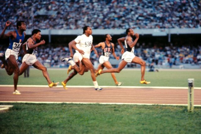 Jim Hines, pictured winning the 1968 Olympic 100m title, was the first man to break the 10