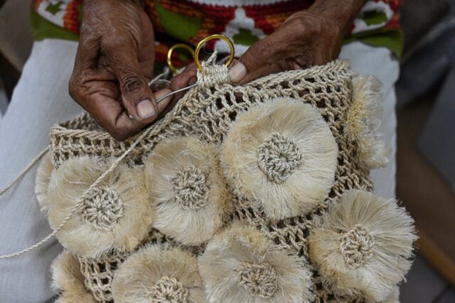 Weaving traditional 'bilum' bags has provided a solid income for some women in impoverishe