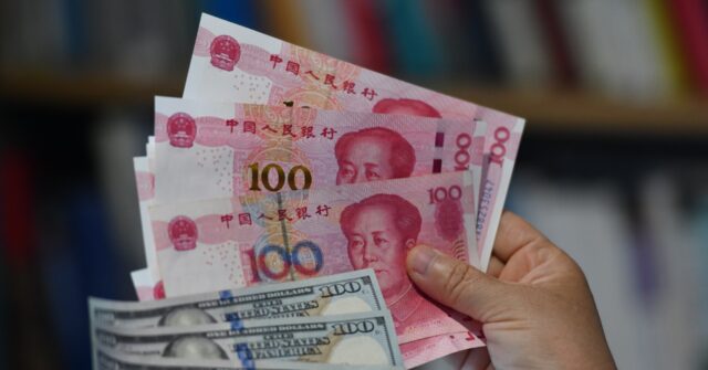 China Sells Dollars in Desperate Bid to Keep Yuan Afloat