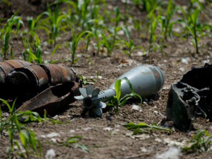 Unexploded shells and other weaponry is displayed by a Ukrainian specialized team searchin