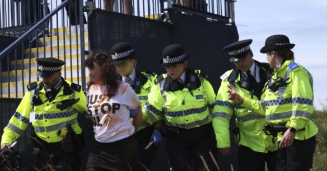 Just Stop Oil Activists Disrupt Play at British Open by Throwing Orange Substance on 17th Green