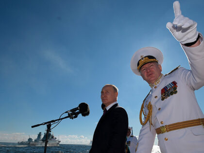 Russian President Vladimir Putin, left, and Commander-in-Chief of the Russian Navy Nikolai