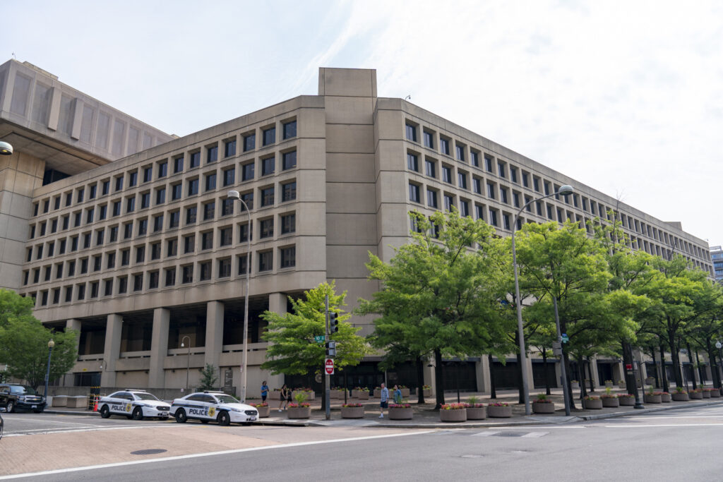 The J. Edgar Hoover FBI Building is seen Friday, June 9, 2023, in Washington. Former President Donald Trump has been indicted on charges of mishandling classified documents at his Florida estate. The remarkable development makes him the first former president in U.S. history to face criminal charges by the federal government that he once oversaw. (AP Photo/Alex Brandon)