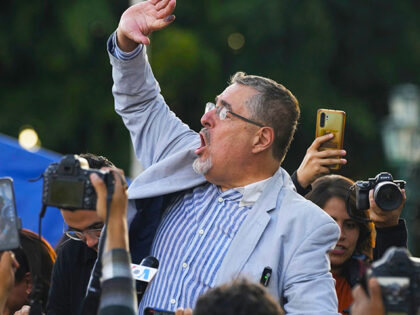 Guatemalan presidential candidate Bernardo Arevalo of the Semilla party celebrates the election results with supporters at Constitution Square in Guatemala City, Monday, June 26, 2023. Arevalo and former first lady Sandra Torres of the UNE party are going to an Aug. 20 presidential runoff. (AP Photo/Moises Castillo)