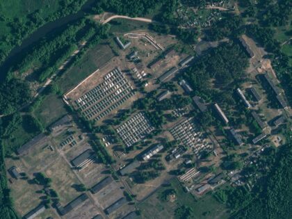 This satellite image provided by Planet Labs PBC and taken on Friday, June 30, 2023, shows apparent recent construction of tents at a former military base outside the Belarusian town of Osipovichi. As part of a deal to end a rebellion in Russia by Wagner Group mercenaries, Belarus’s president says …