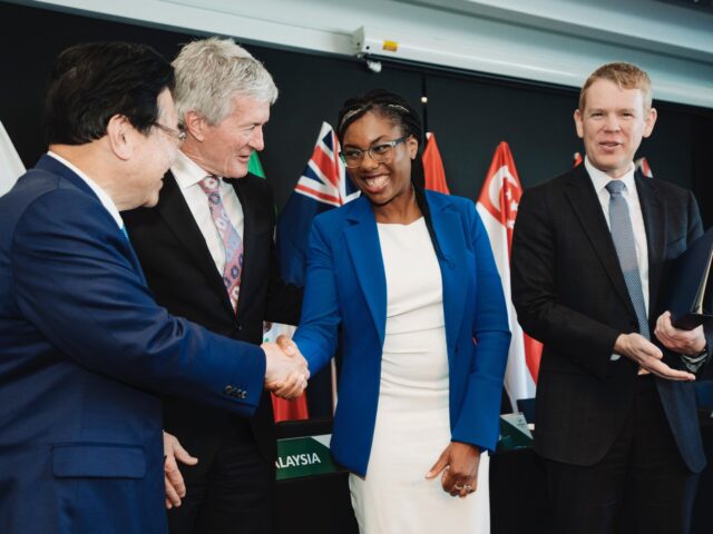 Kemi Badenoch, British Trade Minister, second right, shakes hands with Japan's Minister of