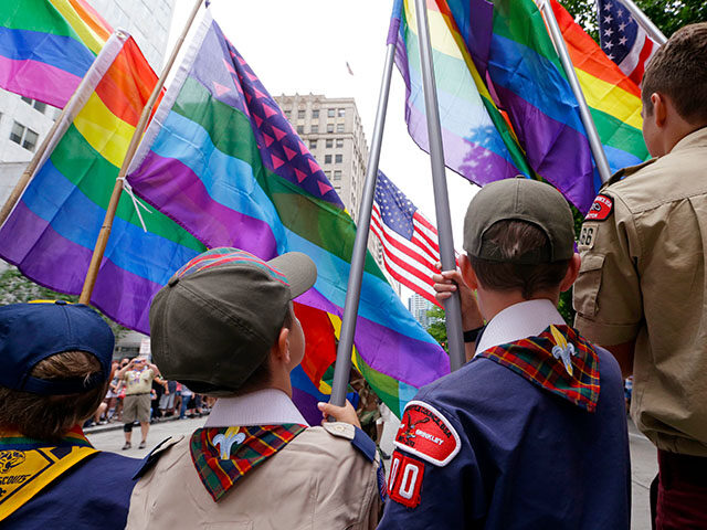 In this Sunday, June 28, 2015 file photo, Cub Scouts and Boy Scouts prepare to lead marche