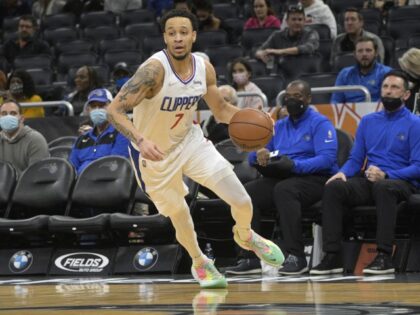 Clippers Magic Basketball Los Angeles Clippers guard Amir Coffey (7) pushes the ball up the court during the first half of an NBA basketball game against the Orlando Magic, Wednesday, Jan. 26, 2022, in Orlando, Fla. (Phelan M. Ebenhack/AP)