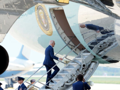 President Joe Biden walks up the steps of Air Force One at Andrews Air Force Base, Md., Thursday, July 20, 2023. Biden is traveling to Philadelphia to court unions as a cornerstone of the country's economic future with a speech at a Philadelphia shipyard. (AP Photo/Manuel Balce Ceneta)