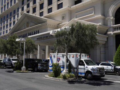 Police and emergency vehicles are staged at Caesars Palace hotel-casino Tuesday, July 11,
