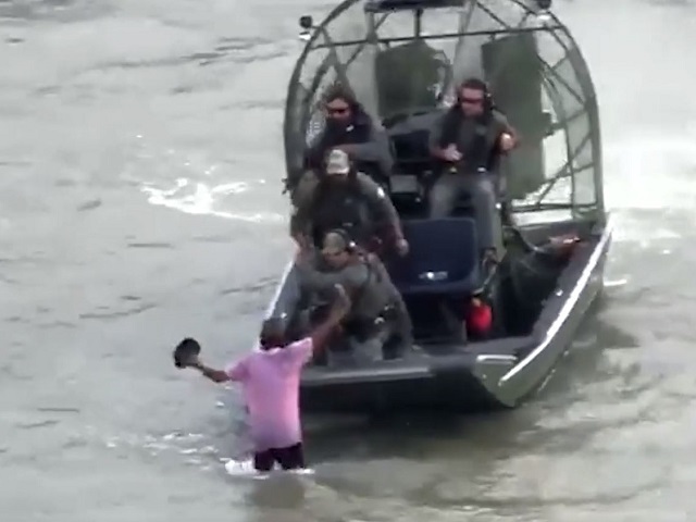 A Texas DPS Tactical Marine Unit arrests an alleged human smuggler in the Rio Grande near Eagle Pass, Texas. (Texas Department of Public Safety)