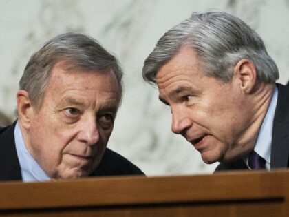 Committee Chairman Sen. Dick Durbin, D-Ill., left, and Sen. Sheldon Whitehouse, D-R.I. confer during a Senate Judiciary Committee's confirmation hearing of Supreme Court nominee Ketanji Brown Jackson, on Capitol Hill in Washington, Thursday, March 24, 2022. (Manuel Balce Ceneta/AP)