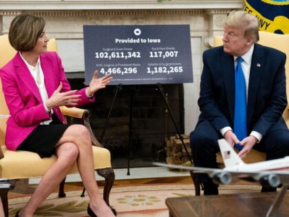 WASHINGTON, DC - MAY 06: U.S. President Donald Trump meets with Iowa Governor Kim Reynolds in the Oval Office at the White House as he continues to promote re-opening business during the coronavirus pandemic May 06, 2020 in Washington, DC. Reynolds lifted some restrictions May 1 in 77 of her …