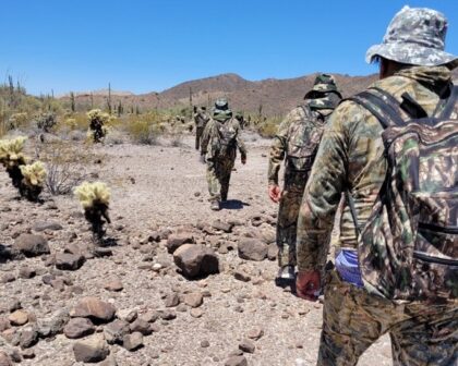 Welton Station Border Patrol agents apprehend a group of camo-wearing migrants in the Sono