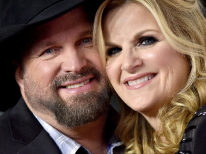 LOS ANGELES, CALIFORNIA - FEBRUARY 08: Garth Brooks and Trisha Yearwood attend MusiCares Person of the Year honoring Dolly Parton at Los Angeles Convention Center on February 08, 2019 in Los Angeles, California. (Photo by Axelle/Bauer-Griffin/FilmMagic)