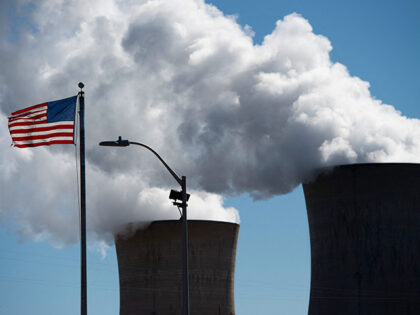 Steam rises out of the nuclear plant on Three Mile Island, with the operational plant run by Exelon Generation, in Middletown, Pennsylvania on March 26, 2019. - Forty years after the partial meltdown at the Three Mile Island nuclear plant, John Garver can still recall the smell and a metallic …
