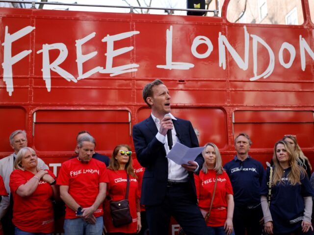 The Reclaim Party's Laurence Fox speaks during the unveiling of his battle bus for the Lon