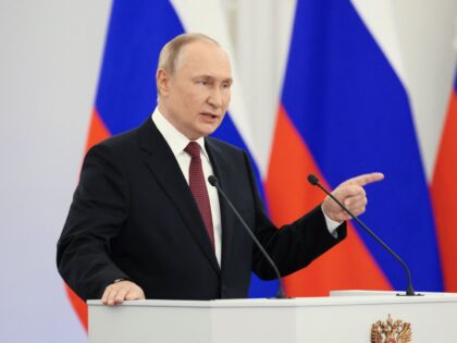 Russian President Vladimir Putin gives a speech during a ceremony formally annexing four r