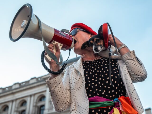 A trans rights activist addresses a protest opposite Downing Street on 21 January 2023 in