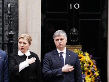 Ukrainian Ambassador to the UK, Vadym Prystaiko and his wife Inna Prystaiko outside 10 Downing Street, London, as they observe a minute's silence to mark the one-year anniversary of the Russian invasion of Ukraine. Picture date: Friday February 24, 2023. (Photo by Jordan Pettitt/PA Images via Getty Images)