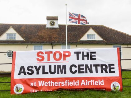 A protest sign against plans for a new asylum processing centre at MDP Wethersfield, a for