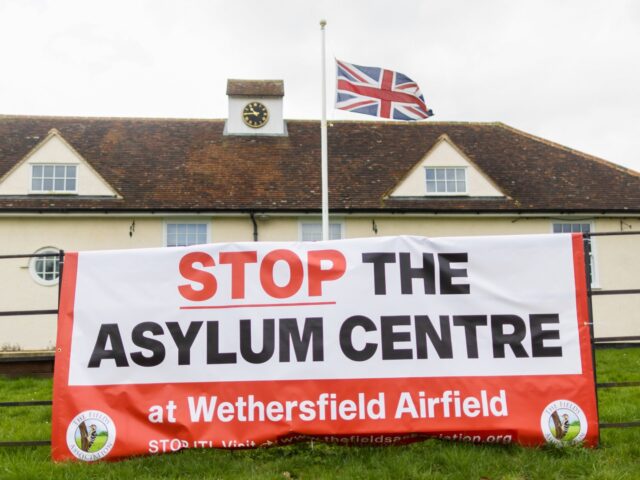 A protest sign against plans for a new asylum processing centre at MDP Wethersfield, a for