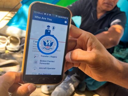 A migrant shows the CBP One App from the US Customs and Border Protection agency, to use to apply for an appointment to claim asylum, on a phone in Ciudad Juarez, Chihuahua state, Mexico, on May 10, 2023. The US on May 11, 2023, will officially end its 40-month Covid-19 …