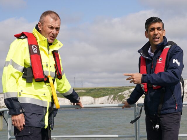 DOVER, ENGLAND - JUNE 05: Prime Minister Rishi Sunak with director of Small Boats Operatio