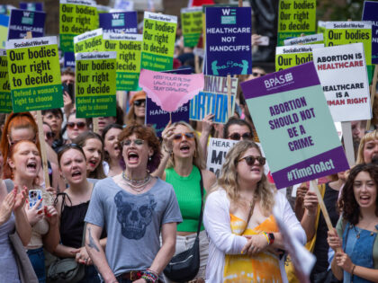 Campaigners from groups including the Women's Equality party, the Fawcett Society and the British Pregnancy Advisory Service (Bpas) attend a rally outside Downing Street after a march from the Royal Courts of Justice to demand reform of the abortion law on 17 June 2023 in London, United Kingdom. The march …