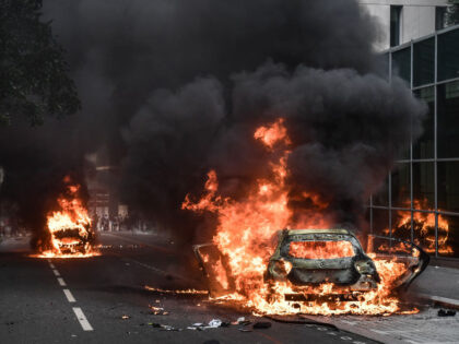 PARIS, FRANCE - JUNE 29: A view of cars that are set on fire during a protest against the death of 17-year-old Nahel, who was shot in the chest by police in Nanterre on June 27, in Paris, France on June 29, 2023. At least 150 protesters have been arrested …
