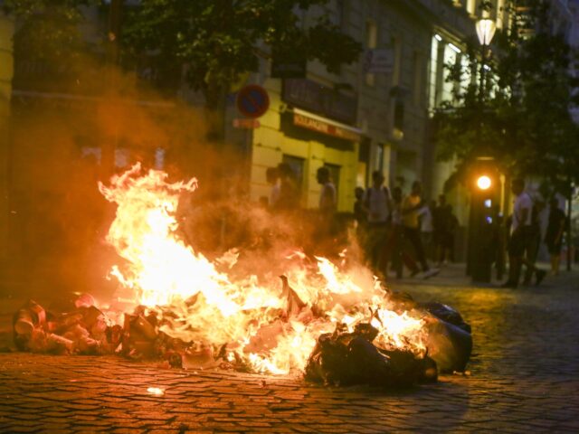 MARSEILLE, FRANCE - JULY 01: A view of a burning garbage as people gather to protest against the death of 17-year-old Nahel, who was shot in the chest by police in Nanterre on June 27, in Marseille, France on July 01, 2023. More than 600 people were arrested across France …