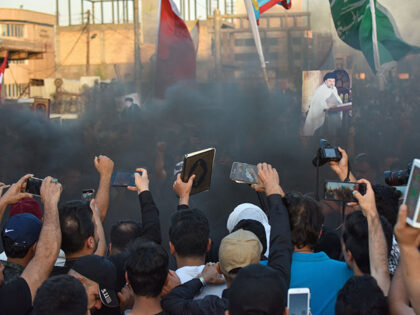 Followers of Shia Leader Muqtada al-Sadr gather to protest the burning of the Muslim holy book, the Quran, by an extremist in Stockholm, in Basra, Iraq on July 2, 2023. (Photo by Haidar Mohammed Ali/Anadolu Agency via Getty Images)