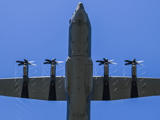 CANBERRA, AUSTRALIA - APRIL 25: A C130 Hercules during a flypast over Australian War Memor
