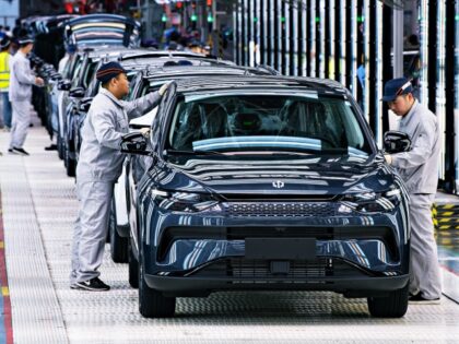 JINHUA, CHINA - APRIL 26: Employees work on the assembly line of C11 electric SUV at a factory of Chinese EV startup Leapmotor on April 26, 2023 in Jinhua, Zhejiang Province of China. (Photo by Hu Xiaofei/VCG via Getty Images)
