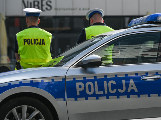 KRAKOW, POLAND - JUNE 20, 2023: Members of the local Police are seen outside the ICE Co