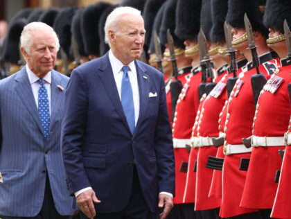 WINDSOR, ENGLAND - JULY 10: King Charles III and US President Joe Biden review a guard of