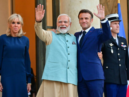PARIS, FRANCE - JULY 13: French President Emmanuel Macron and his wife Brigitte Macron greet Narendra Modi, Prime Minister of India for an official dinner at the Elysee Presidential Palace on July 13, 2023 in Paris, France. India's Prime Minister Narendra Modi is paying an official visit to France from …