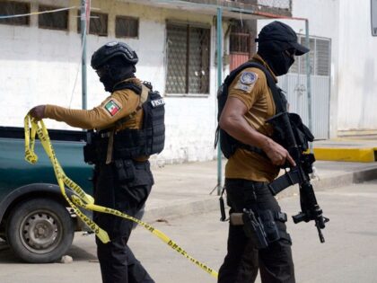 Members of the tactical intervention team check the area where Mexican journalist Nelson Mateus was murdered in the resort town of Acapulco, Guerrero state, Mexico, July 15, 2023. A Mexican journalist was shot to death in a store parking lot on Saturday July 15, 2023 in the southern tourist town …