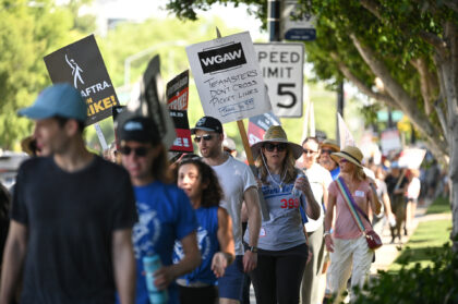 Hollywood actors, writers and their supporters walk the picket line July 18, 2023 outside