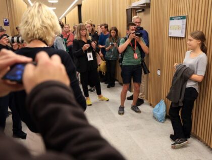 Journalists take footage as Swedish climate activist Greta Thunberg, charged after a climate action in the Norra hamnen neighbourhood in Malmo, waits for the start of her trial at the District Court in Malmo, Sweden on July 24, 2023. Swedish climate campaigner Greta Thunberg goes on trial on July 24 …