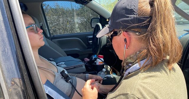 EXCLUSIVE: Texas Troopers Aid Dehydrated Pregnant Venezuelan Migrant at Border