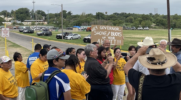 Protesters gather at Eagle Pass to demonstrate against floating border barrier. (Randy Clark/Breitbart Texas)