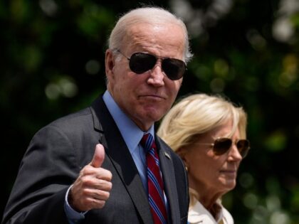 WASHINGTON, DC - JULY 14: U.S. President Joe Biden gives a thumbs up as he walks with first lady Jill Biden to Marine One on the South Lawn of the White House July 14, 2023 in Washington, DC. Biden is spending the weekend at Camp David in Maryland. (Photo by …