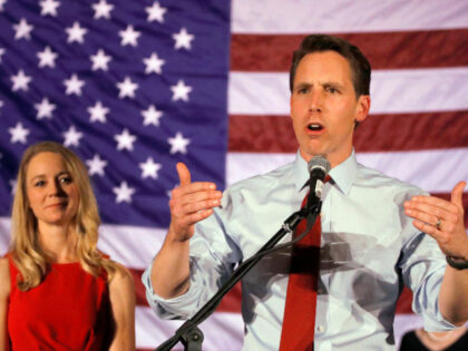 FILE - In this Nov. 6, 2018 file photo, Sen.- elect Josh Hawley makes his victory speech while his wife Erin watches in Springfield, Mo. Missouri's Republican Secretary of State Jay Ashcroft on Monday, Dec. 10, 2018, asked the Democratic auditor for help investigating Sen.-elect Hawley over allegations that he …